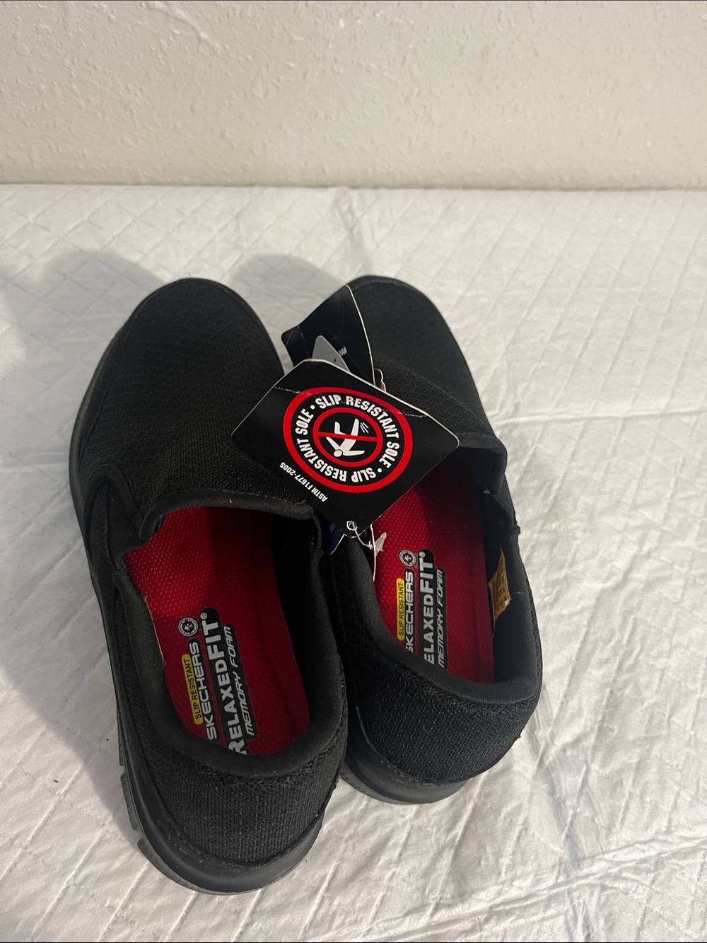 Skechers Men’s Slip-On Work Loafers in Black with Red Insole